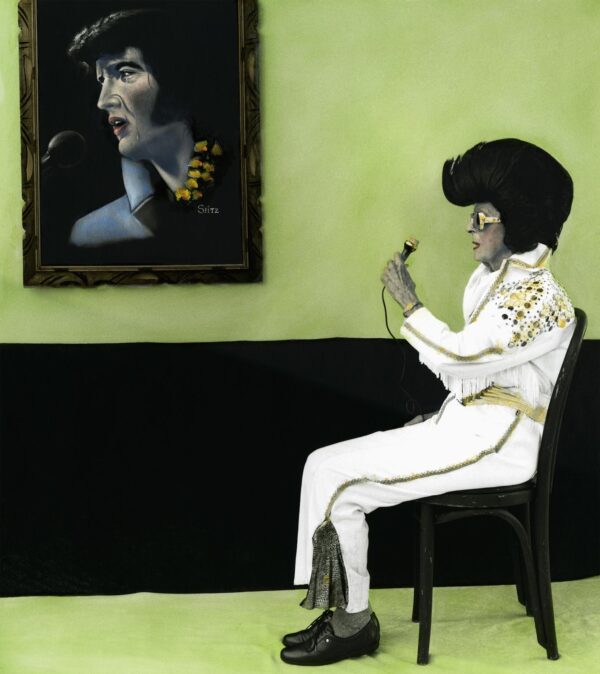 A painting of elvis presley sitting in front of a microphone.