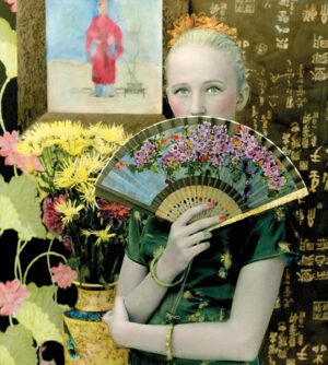 A woman holding a fan in front of her face.