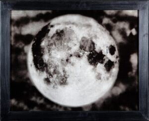 A black and white photo of the moon.