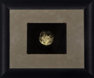 A picture of the moon taken by an individual.