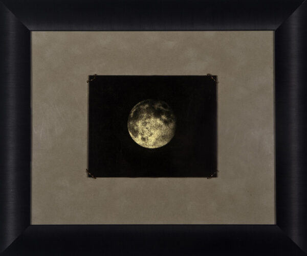 A picture of the moon taken by an individual.
