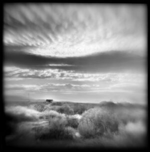 A black and white photo of clouds in the sky.