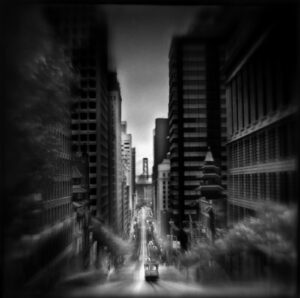 A black and white photo of a city street