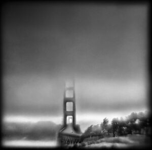 A black and white photo of the golden gate bridge.