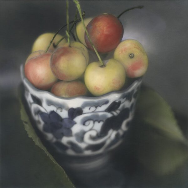 A bowl of apples is shown in this painting.