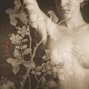 A woman with flowers in her hair and breast.