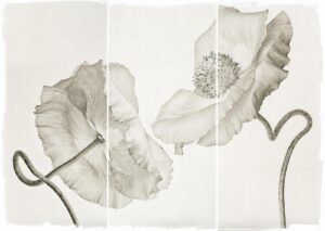 A black and white photo of flowers on a table