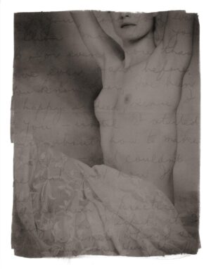 A black and white photo of a man 's torso.