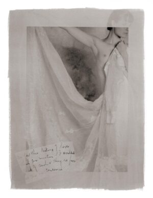 A black and white photo of a woman in a shower.