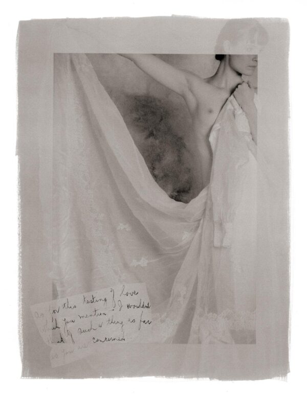 A black and white photo of a woman in a shower.