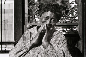A black and white photo of an older woman