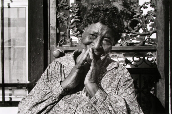 A black and white photo of an older woman