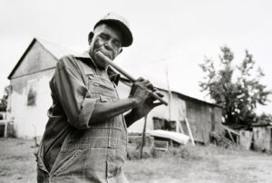 A man holding a baseball bat in his hands.