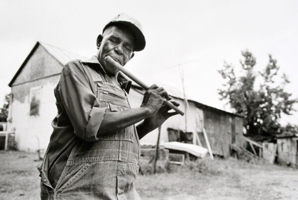 A man holding a baseball bat in his hands.