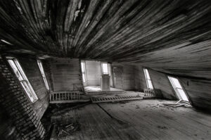 A room with wooden floors and walls.