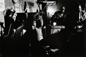 A group of people sitting in a room.