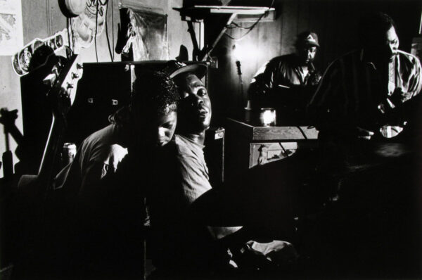 A group of people sitting in a room.