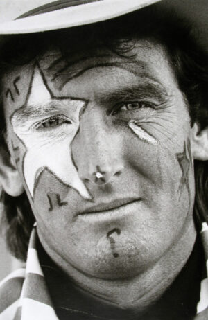 A man with face paint on his face.