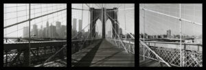 A black and white photo of the brooklyn bridge.