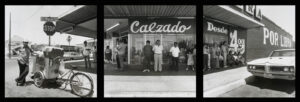 A group of people standing in front of a store.