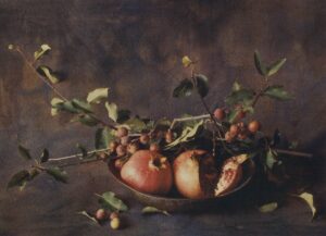 A painting of apples and grapes in a bowl.