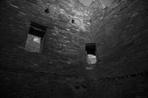 A black and white photo of an old building.