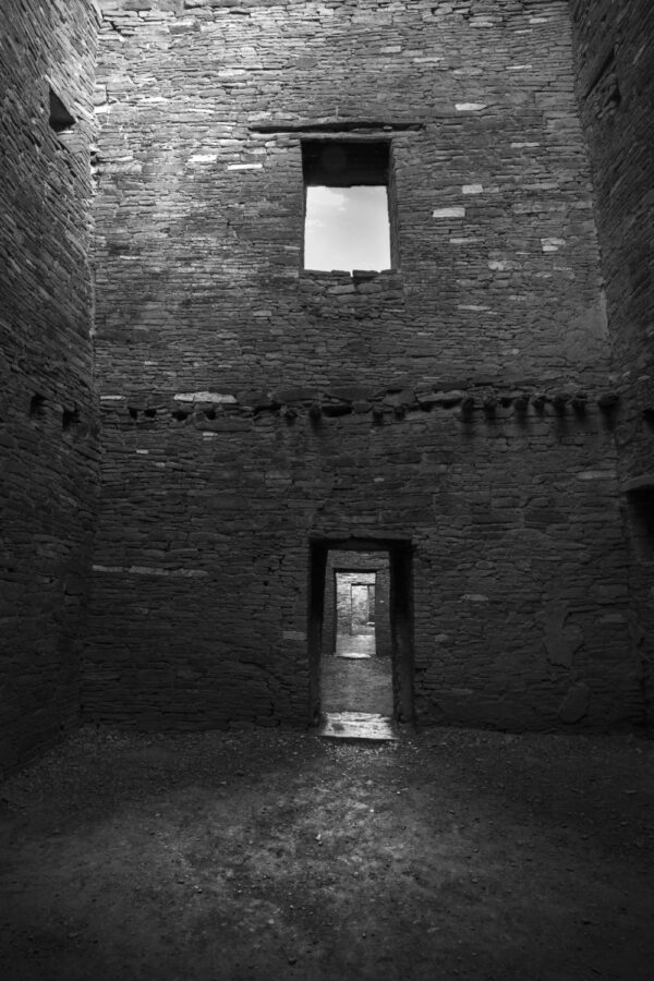 A room with brick walls and a window.