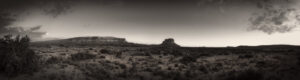 A black and white photo of the desert