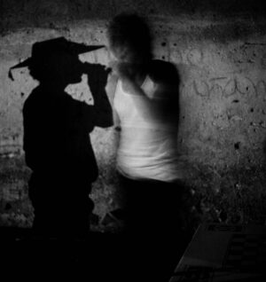 A man and woman standing next to each other.