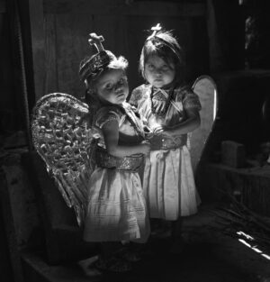 Two little girls dressed up as fairies