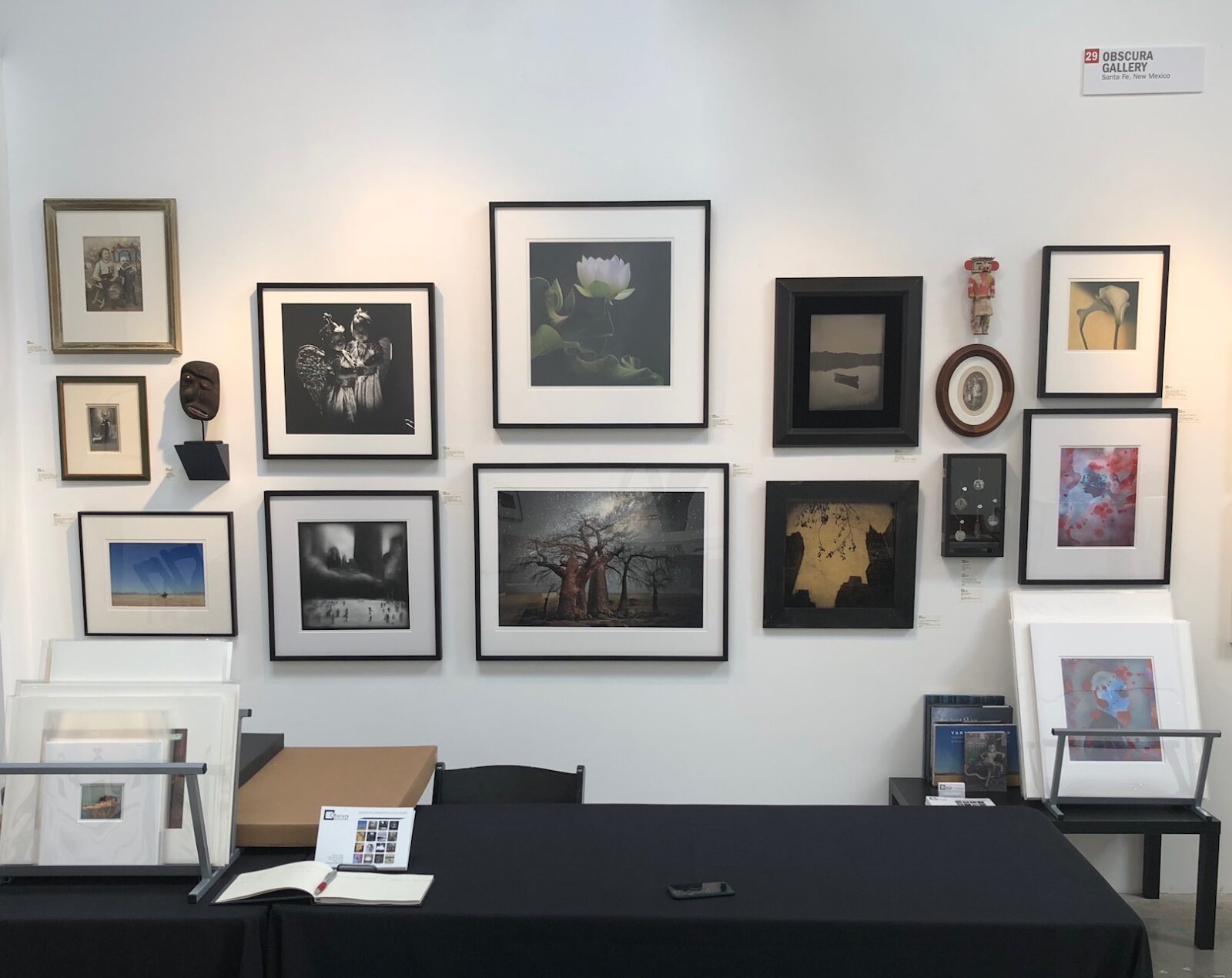 A room with many pictures on the wall