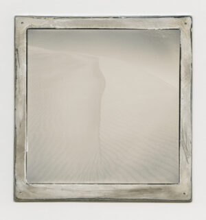 A square mirror with a white background