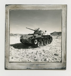 A tank is shown in the desert.