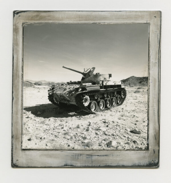 A tank is shown in the desert.
