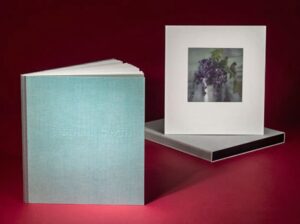 A book with a picture of flowers on the cover.