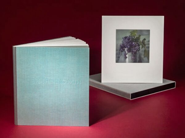 A book with a picture of flowers on the cover.