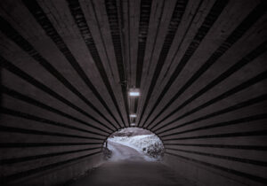 A tunnel with lights and a light in it