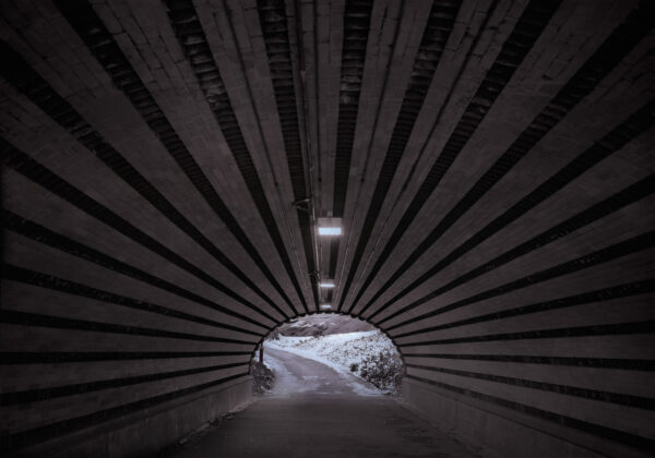 A tunnel with lights and a light in it