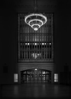 A large building with lights hanging from the ceiling.