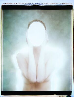 A blurry image of a person with no shirt