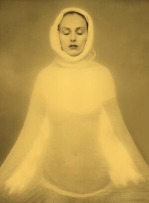 A woman in white is sitting in the air
