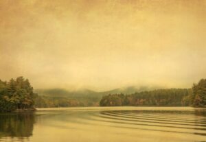 A painting of a lake with trees in the background