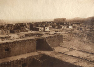 A black and white photo of an old town.