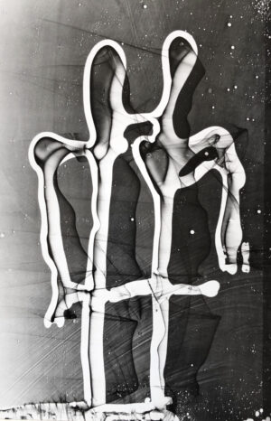 A black and white photo of an abstract sculpture.
