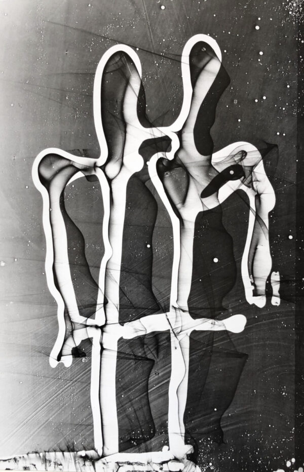 A black and white photo of an abstract sculpture.