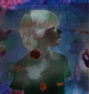 A child with red earrings and blue background