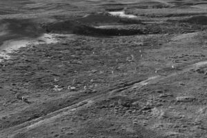A black and white photo of some dirt