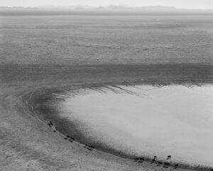 A black and white photo of a body of water