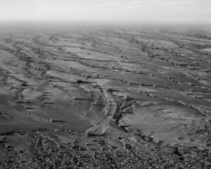 A black and white photo of the desert.