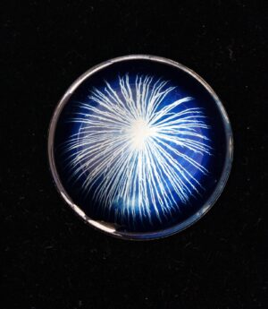 A blue and white light in the dark.